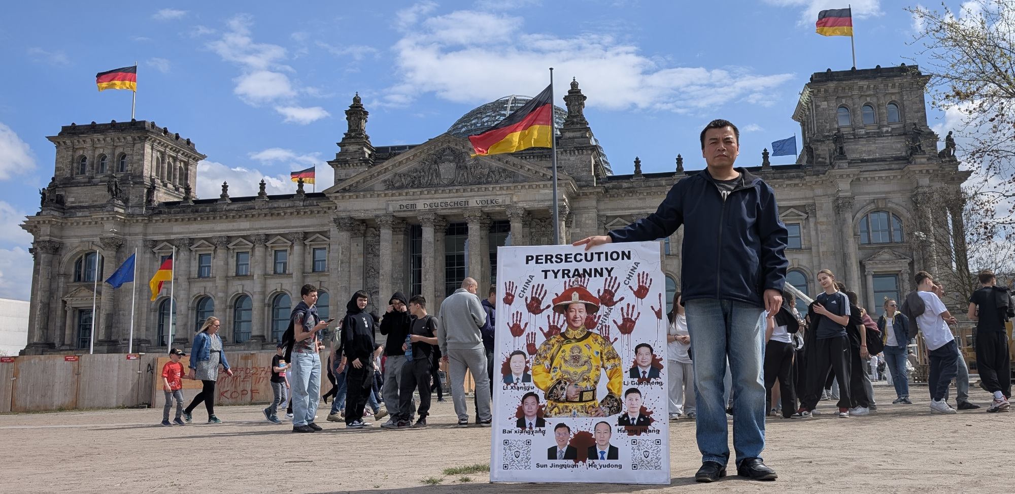 Protesting against the Chinese Communist Party's authoritarianism and Xi Jinping's dictatorship at the German Parliament building on April 15, 2025