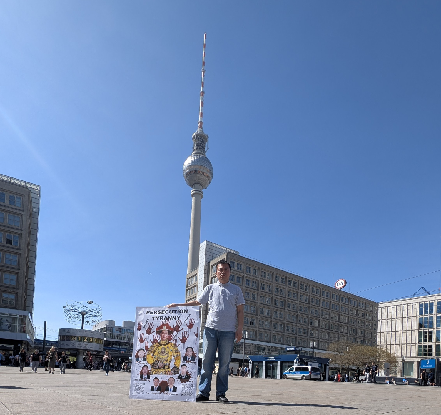 Protesting against the Chinese Communist Party's authoritarianism and Xi Jinping's dictatorship at Alexanderplatz in Berlin, Germany, on April 16, 2025