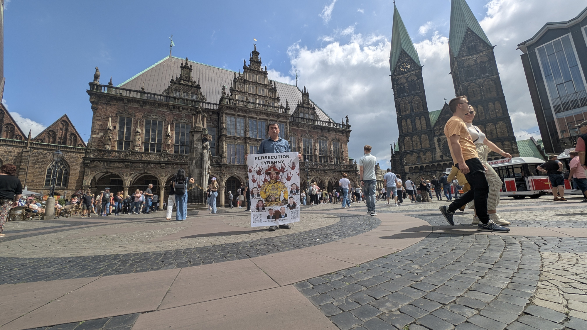 Protesting against the Chinese Communist Party's authoritarianism and Xi Jinping's dictatorship at the Bremen City Hall in Germany, on July 26, 2025.