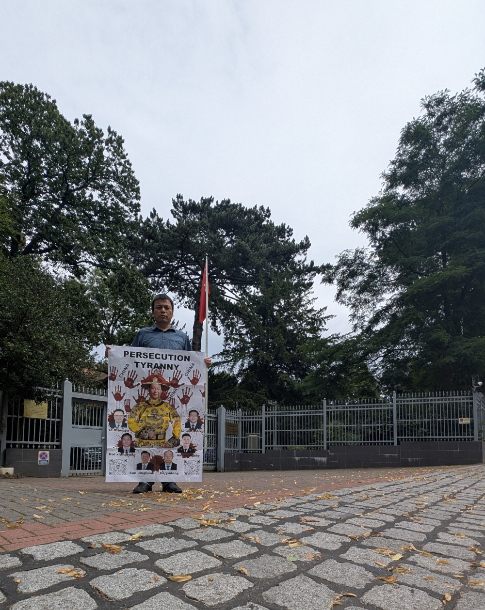 Protesting against the Chinese Communist Party's authoritarianism and Xi Jinping's dictatorship at the Chinese Communist Party's consulate in Hamburg, Germany, on July 21, 2025.
