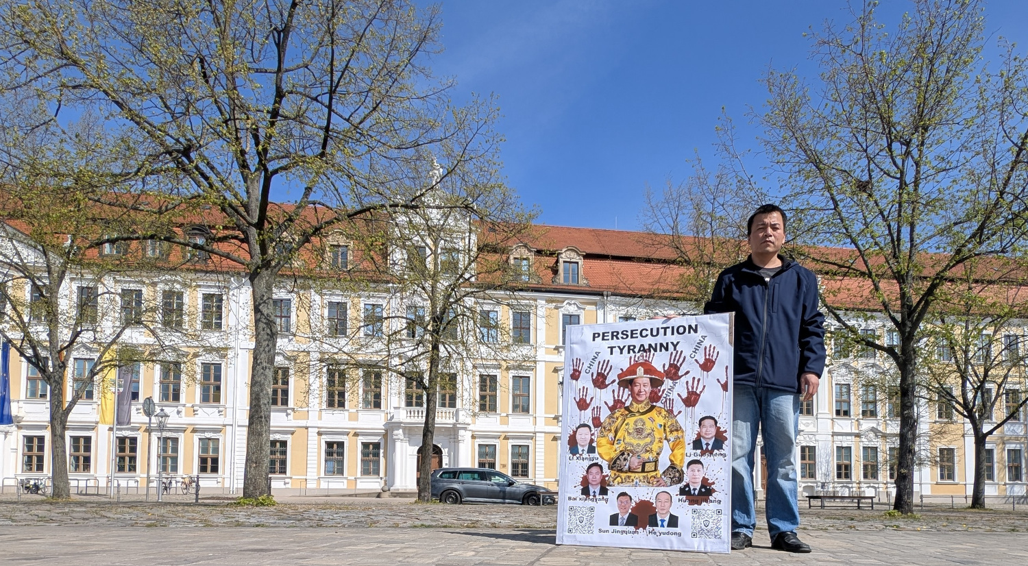 Protesting against the Chinese Communist Party's authoritarianism and Xi Jinping's dictatorship at the Saxony-Anhalt State Parliament building in Germany on April 14, 2025